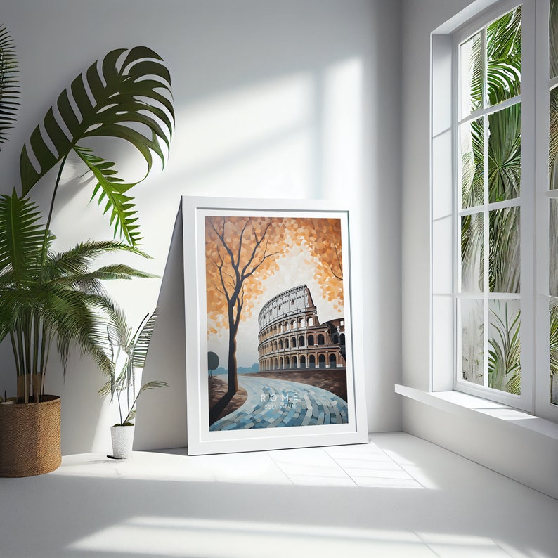 May include: A framed painting of the Colosseum in Rome, Italy. The painting is done in a pixelated style with a blue and white cobblestone path leading to the Colosseum. A tree with orange leaves is in the foreground.
