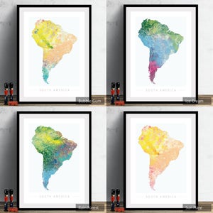 May include: Four framed prints of South America with different watercolor color schemes. The color schemes are: Bubble Gum, Ice Cream, Rain Forest, and Sun Flare.