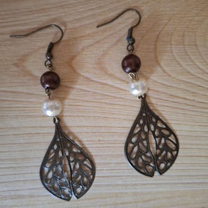 Handmade earrings with glass beads and pearls