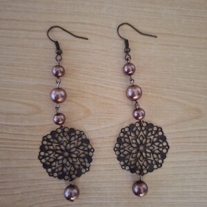 Handmade earrings with glass beads and pearls