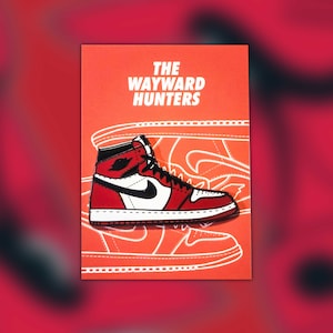 May include: Red and white enamel pin featuring a red and white Air Jordan 1 trainer with black accents. The pin is on a card with the text "The Wayward Hunters".