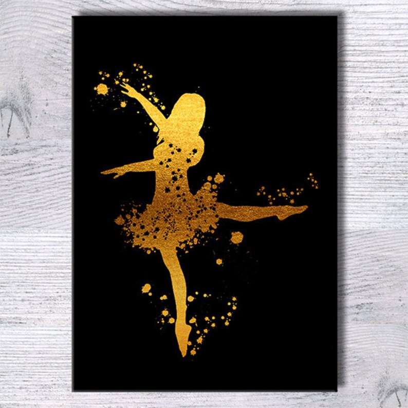May include: A gold silhouette of a ballerina in a dance pose against a black background. The silhouette is made up of gold paint splatters.