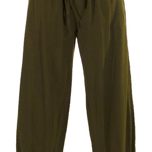 May include: Olive green loose-fitting pants with an elastic waistband and drawstring. The pants have a relaxed fit and are made of a soft, comfortable fabric.