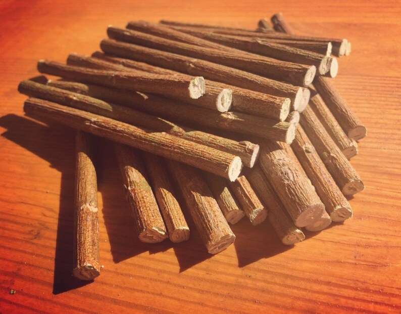 May include: A pile of brown sticks, likely for crafts or a fire starter.