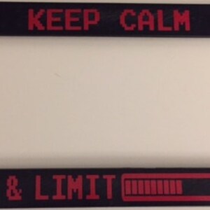 May include: Black license plate frame with red text that reads "KEEP CALM & LIMIT" with a red progress bar graphic.