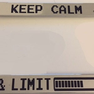 May include: A shiny chrome license plate frame with the words "KEEP CALM" at the top and "& LIMIT" with a loading bar graphic at the bottom. The text is in a pixelated font.