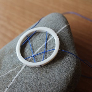 Enamelled porcelain necklace in white blue thread and silver 925, contemporary minimalist ceramic designer jewelry