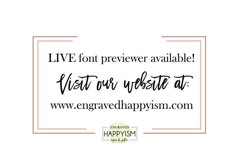 May include: A text graphic with a white background and a brown border. The text reads "LIVE font previewer available! Visit our website at: www.engravedhappyism.com". Below the text is a logo for Engraved Happyism, which features a green leaf and the text "ENGRAVED HAPPYISM signs & gifts".