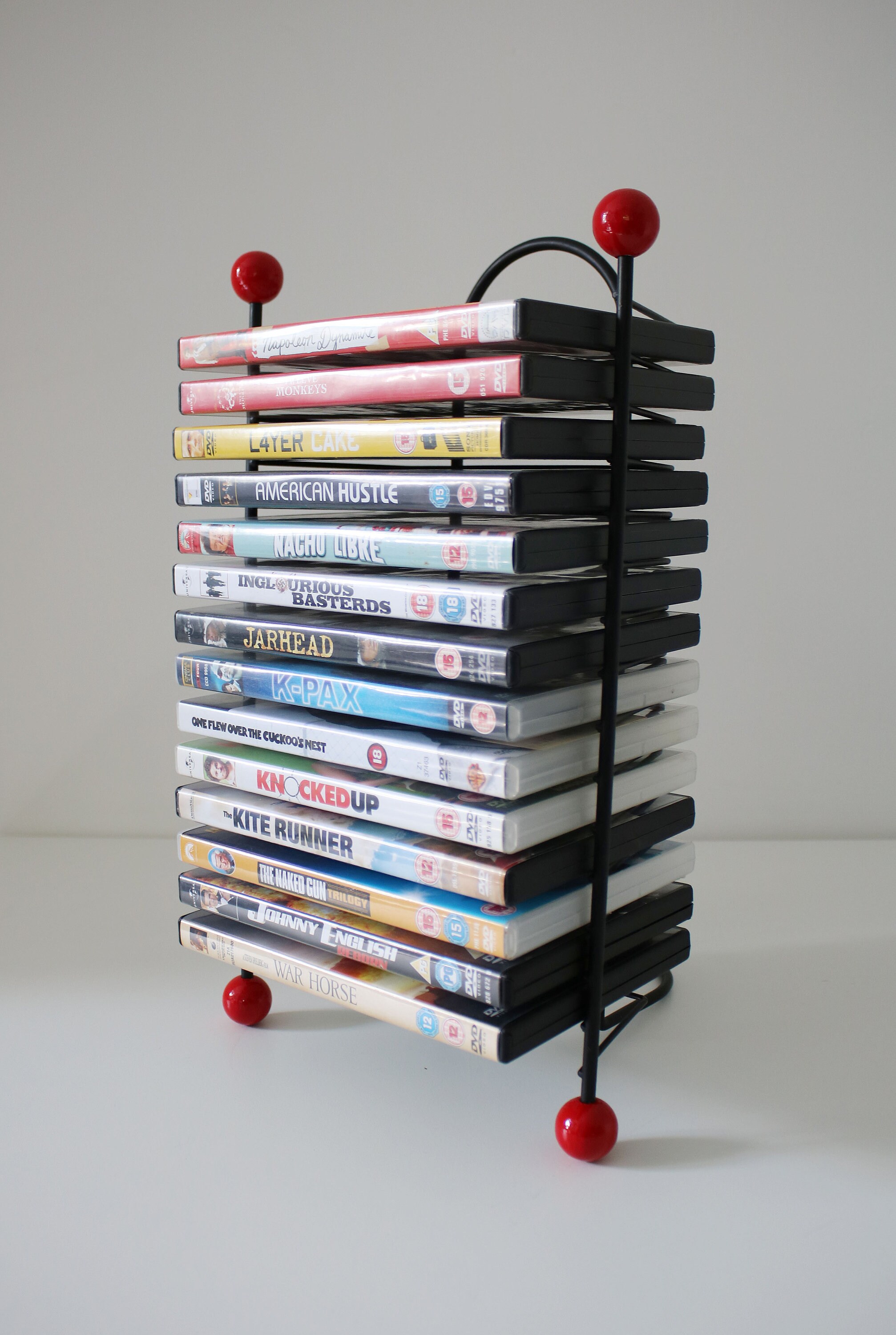 1980s 50s revival DVD rack black wire metal with atomic red bobbles
