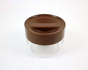 1970s Pyrex JAJ storage jar with brown plastic lid - modernist space age shape