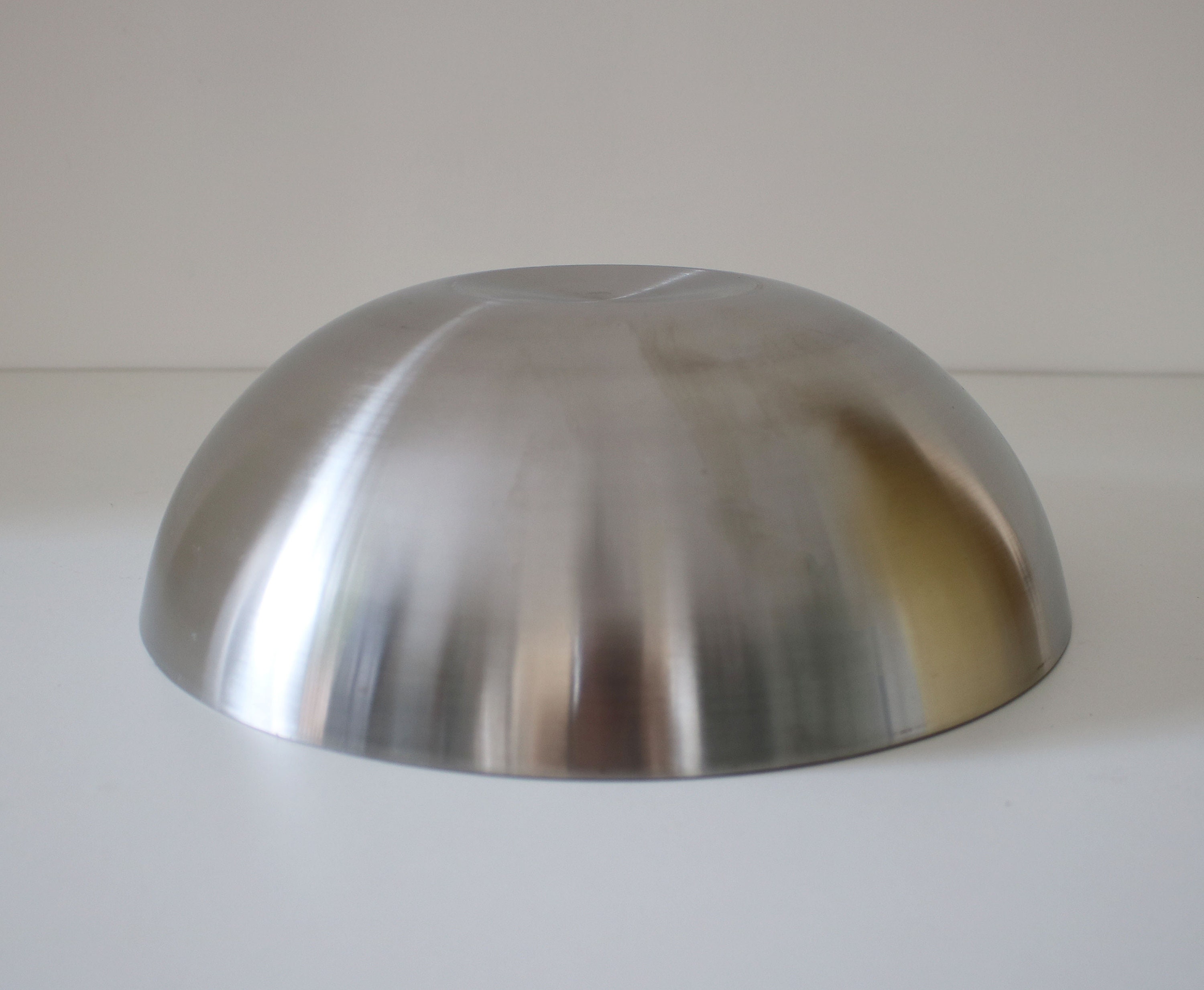 Modernist brushed stainless steel hollow fruit / serving bowl late