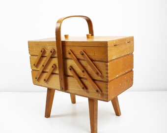 1970s/80s wooden cantilever sewing box jewellery make-up storage on sputnik atomic legs - note condition