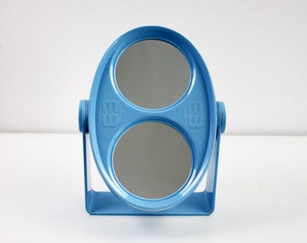 80s / 90s double sided plastic swivel dressing table mirror in blue