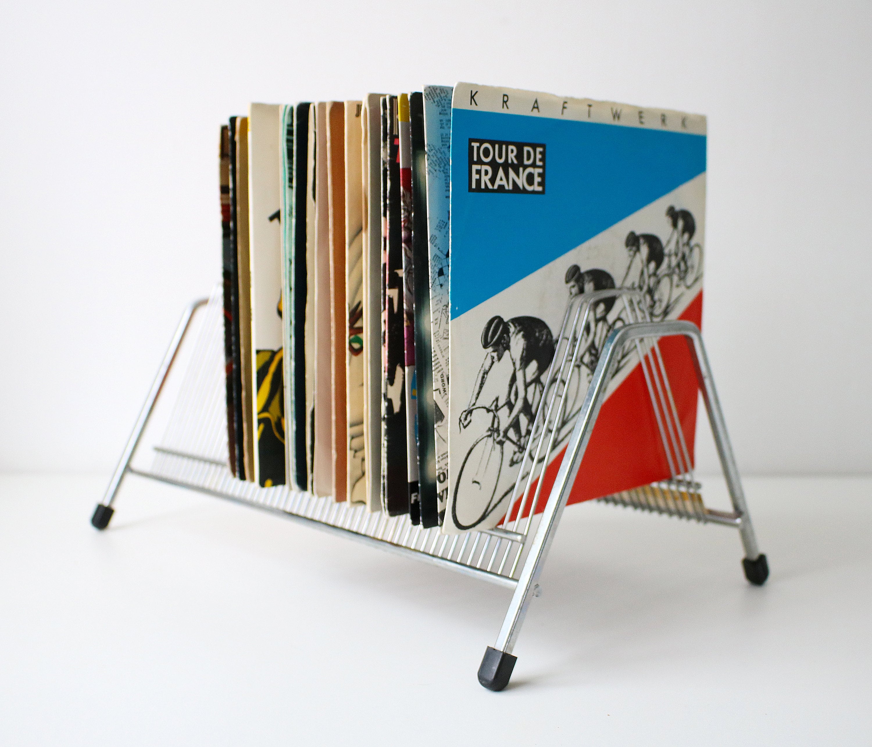 70s modernist record rack in chrome/stainless steel holds 50 records