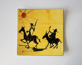 1980s flat dish / curved plate by ceramicist Joan Ramirez - Don Quixote and Sancho Panza