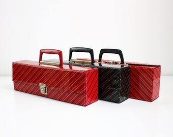 1980s cassette carry cases shiny red or black vinyl with diagonal stripes
