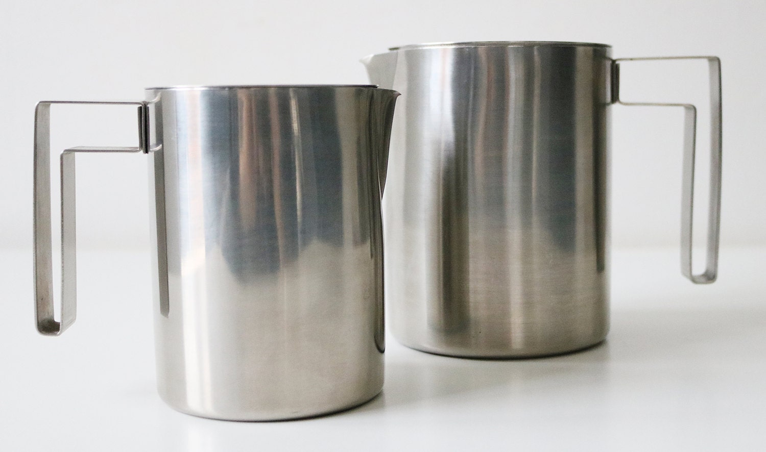 Modernist teak and stainless steel teapot plus hot water jug (or coffee