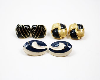 Pair of 1980s clip on earrings. 3 designs to choose from - black gold/ black-blue gold pearl effect/ navy gold cream