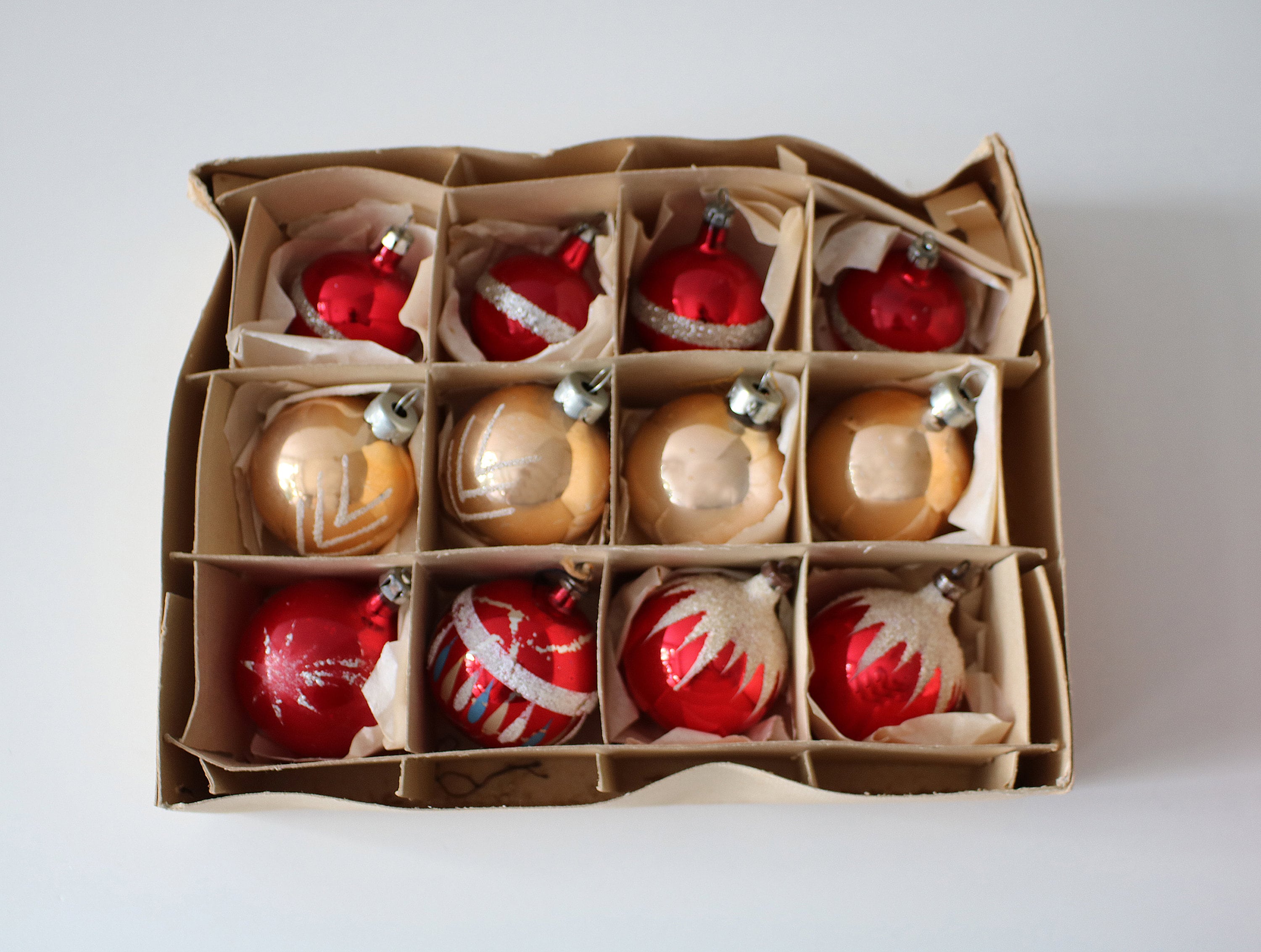 12 Vintage glass christmas baubles in a box. Red and gold selection