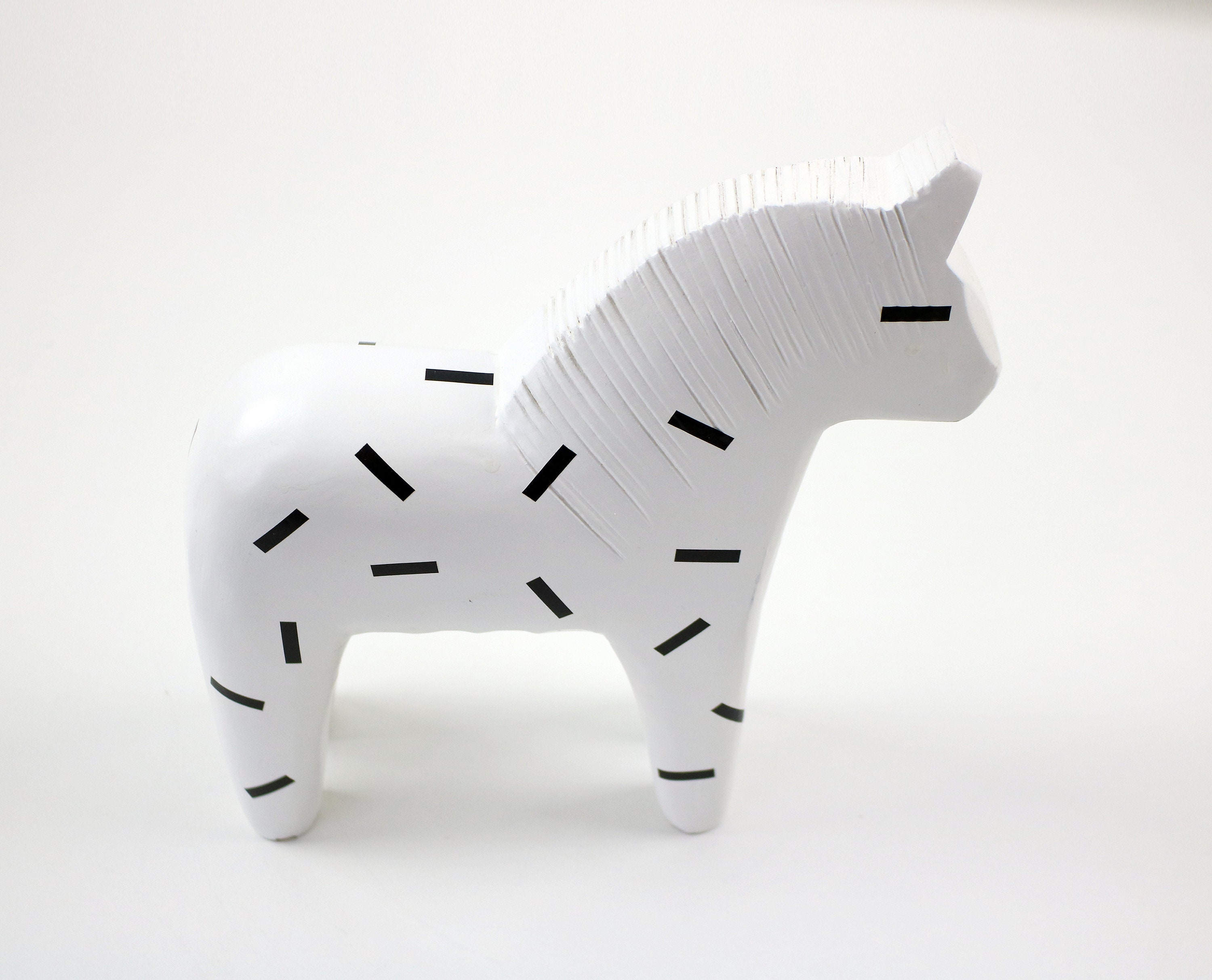 1999 white with black pattern wooden Dala horse for Ikea Finansiell