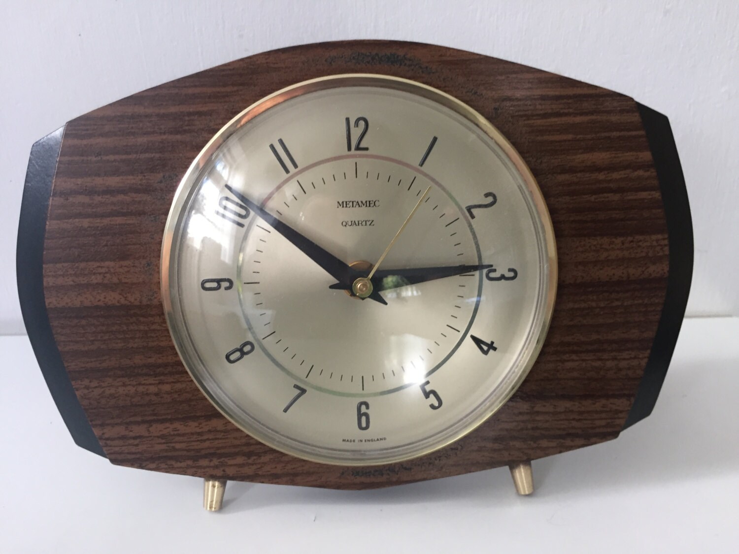 Mid century Metamec battery operated clock teak laminate and brass