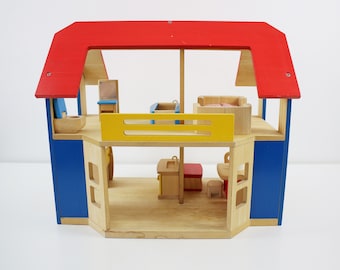Vintage 1990s wooden dolls house with furniture items by Plan Toys - collector's item