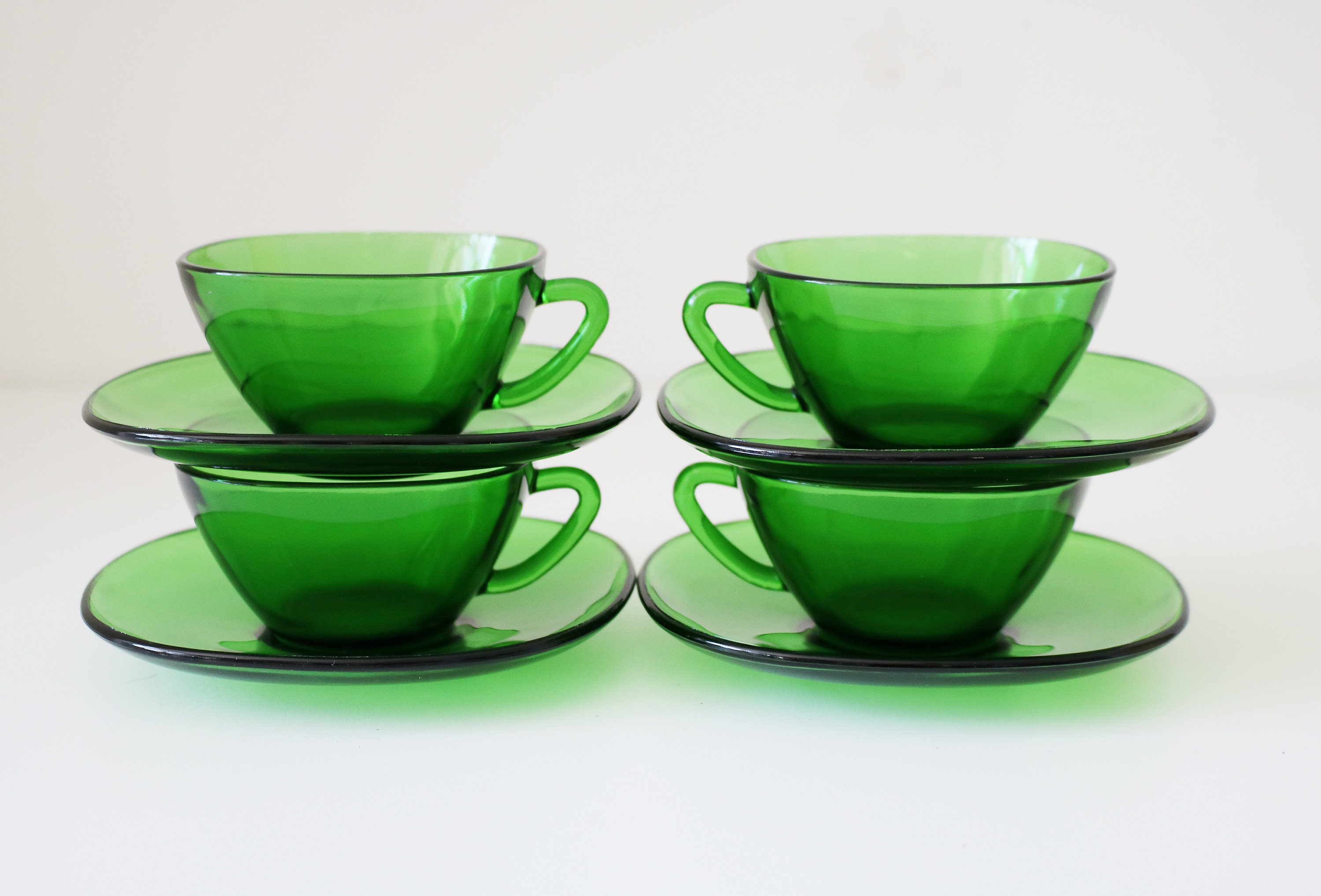 Set of 4 1970s green glass cups and saucers by Vereco of France small