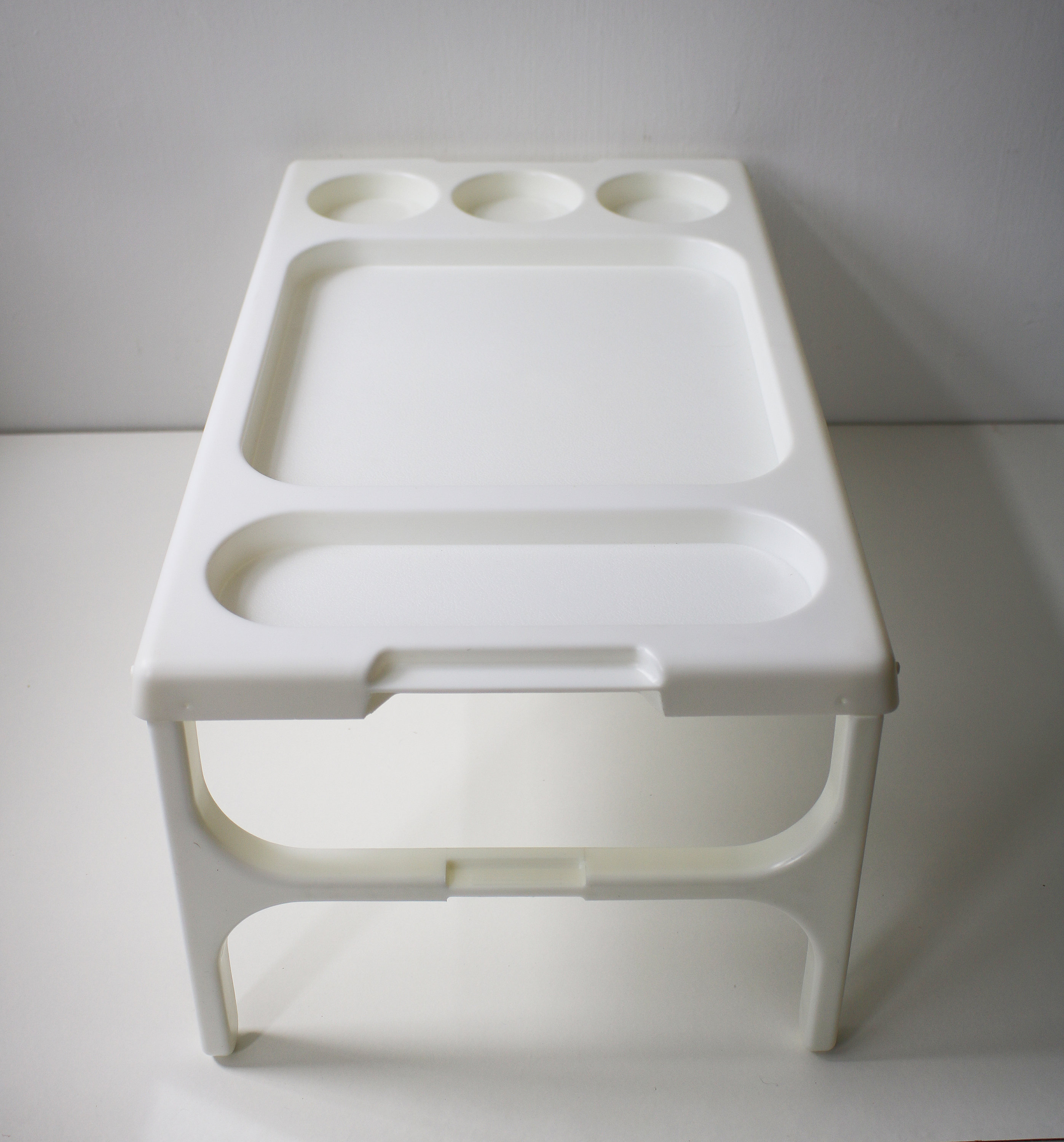 1980s folding plastic tray table designed by Henry C H Wang for Twopo