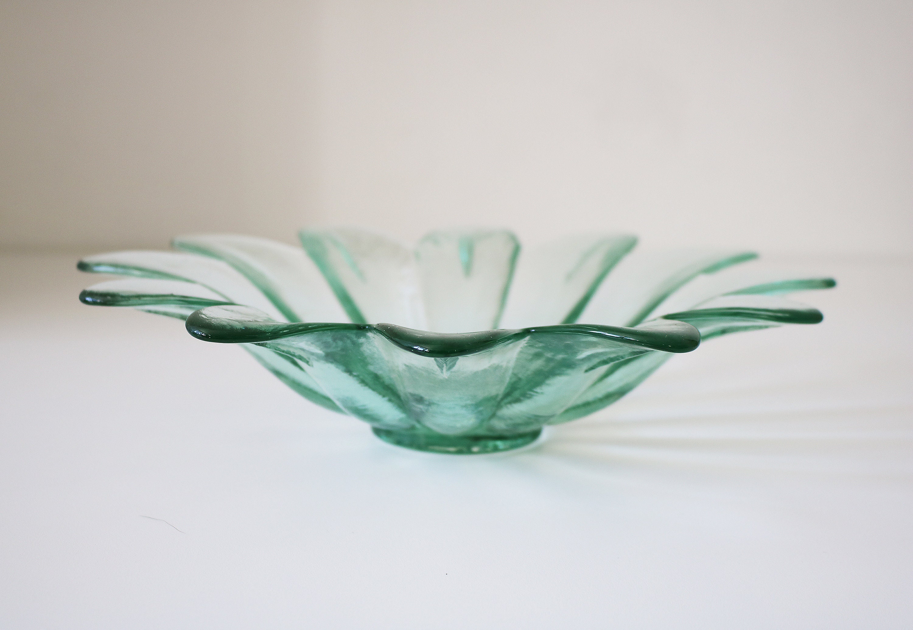 Pressed clear green glass flower shaped bowl in various sizes. Etsy