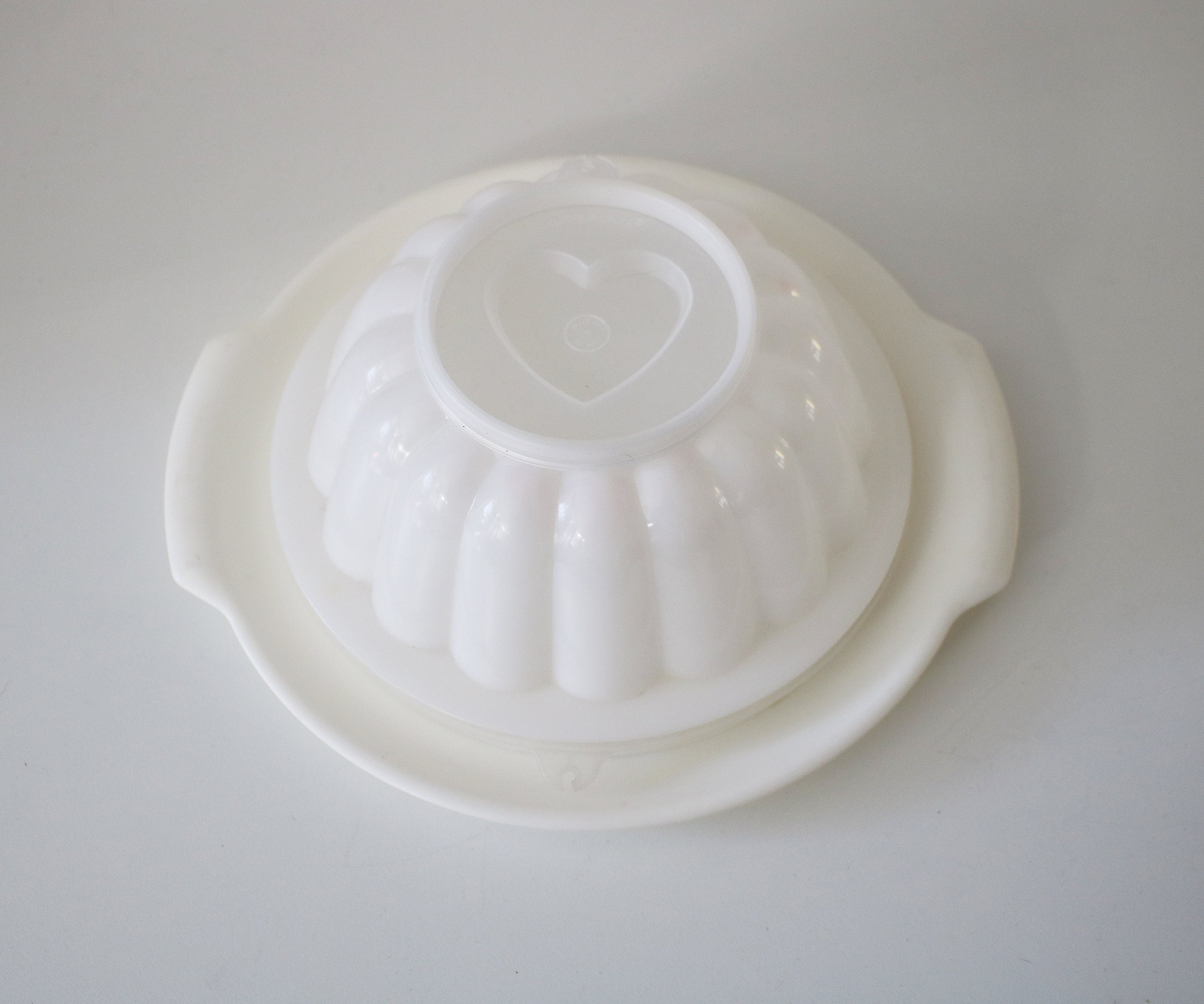 Tupperware jelly mould with seal, serving tray and 4 detail moulds