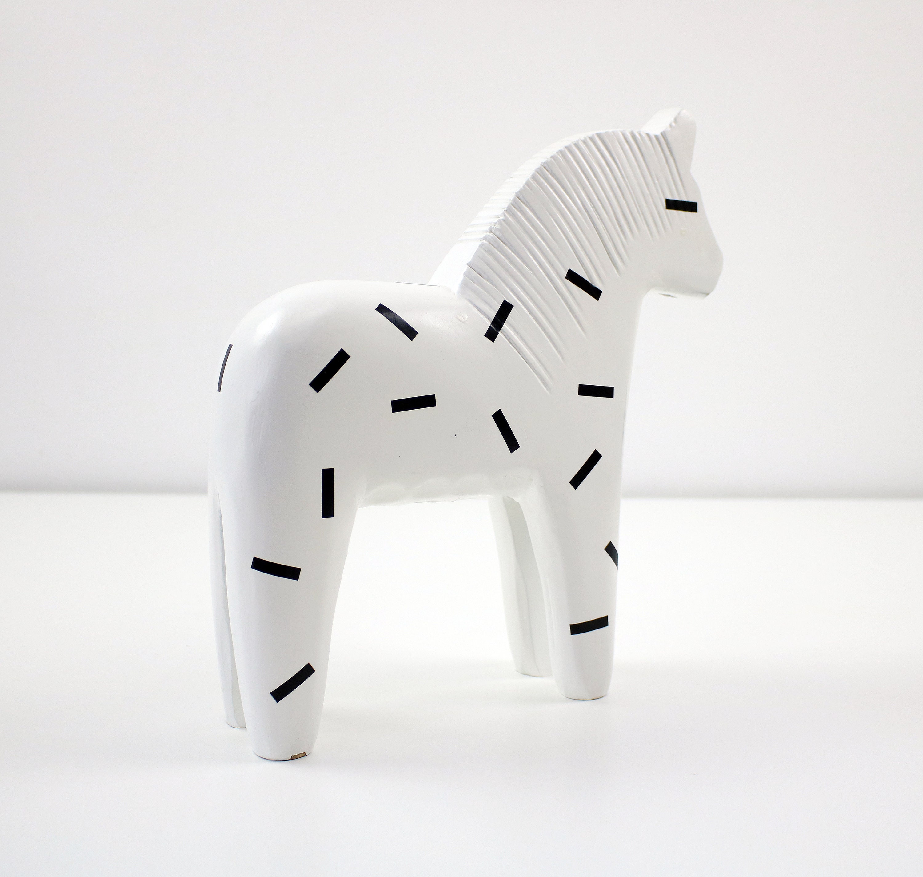 1999 white with black pattern wooden Dala horse for Ikea Finansiell