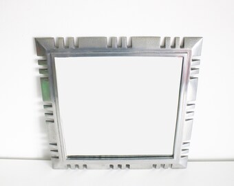 Rare Y2K polished aluminium mirror by Shaw Spencer International - cut out design