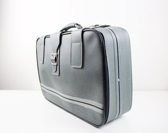Large soft shell suitcase in blue-grey textured vinyl mid-late 20th century
