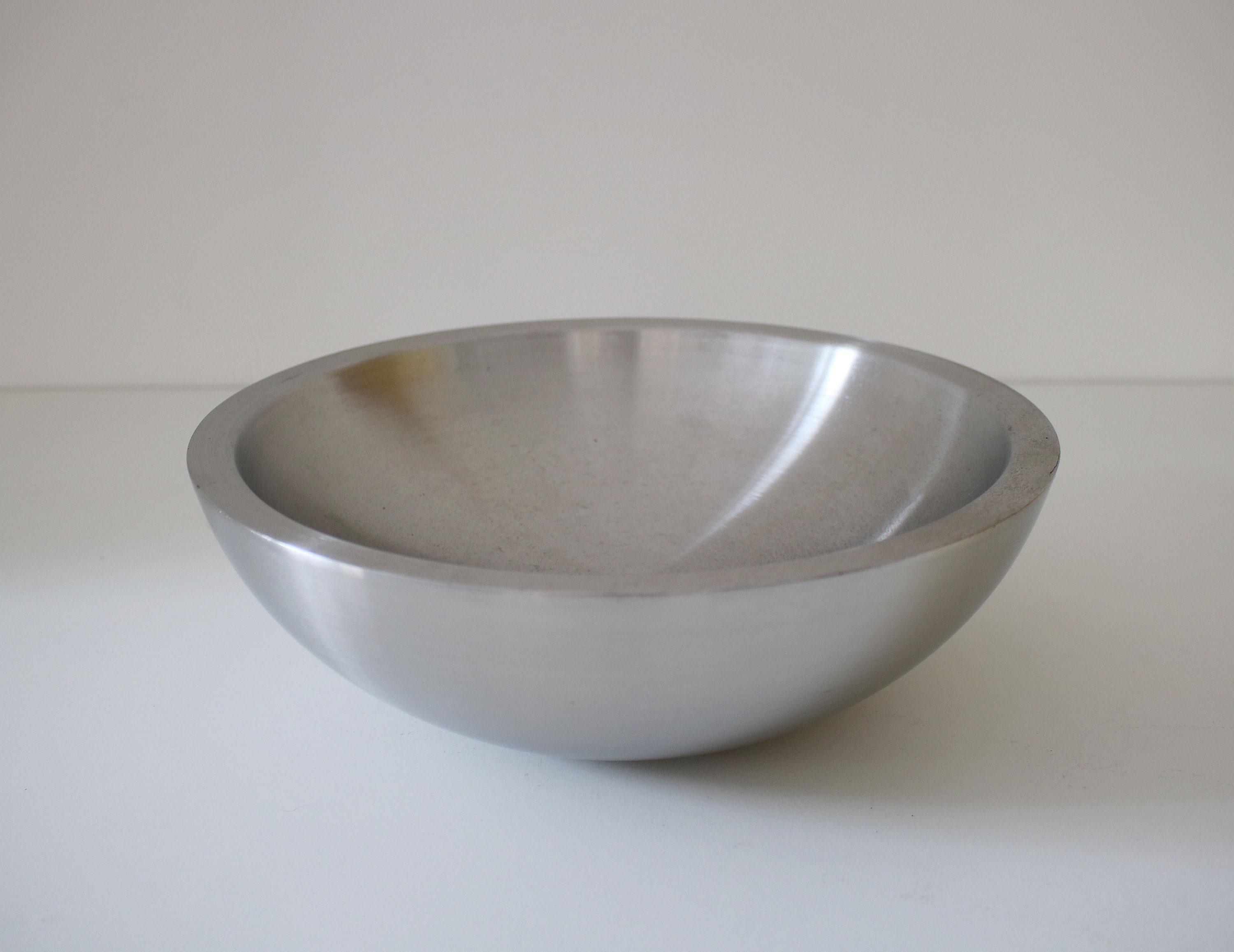 Modernist brushed stainless steel hollow fruit / serving bowl late