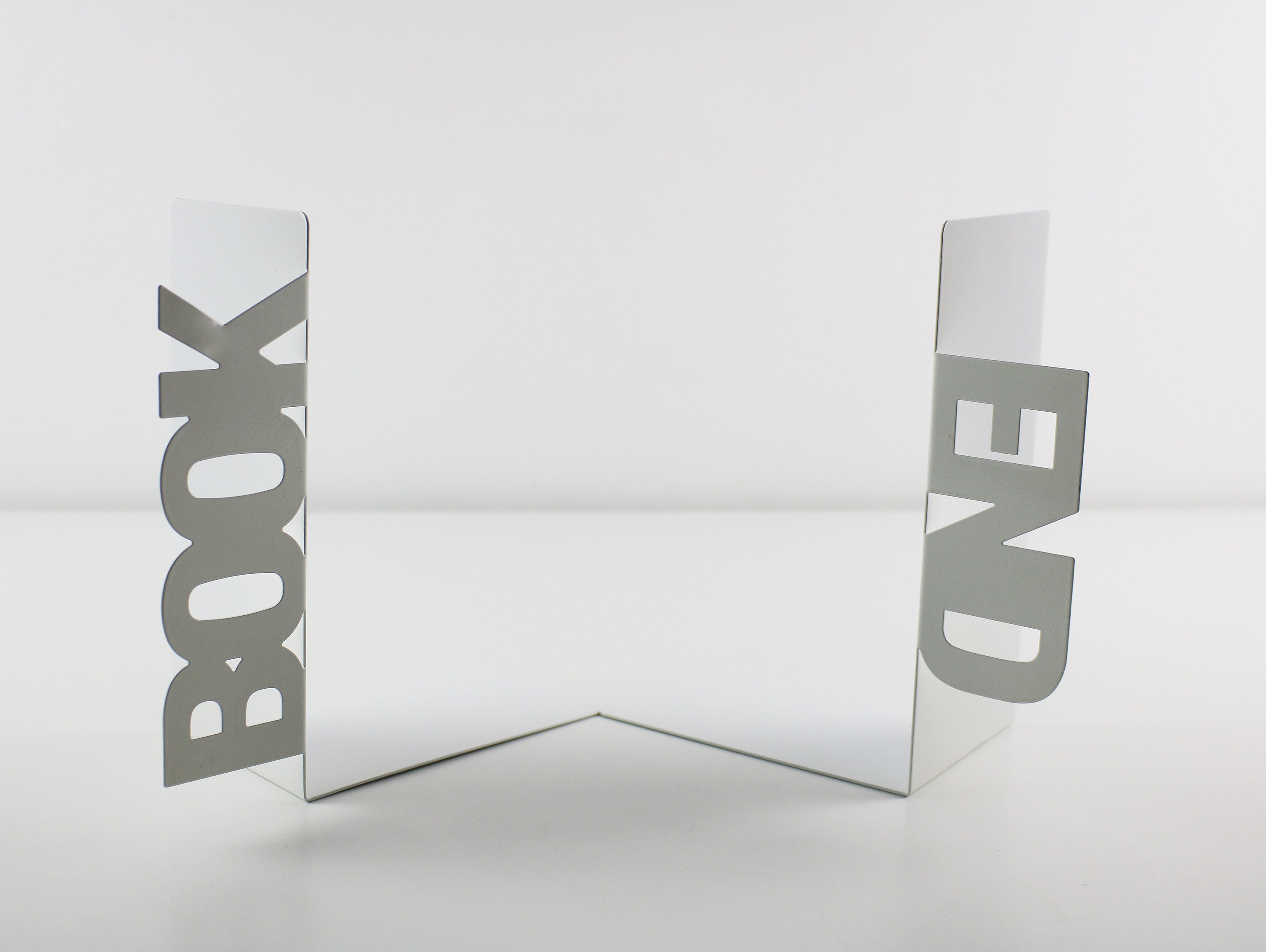 Rare 1980s metal bookends BOOK END cut out words in white enamel by