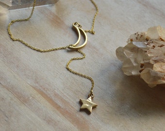 Dainty lariat star and moon necklace. Solid raw brass pendant. Pretty celestial boho jewellery