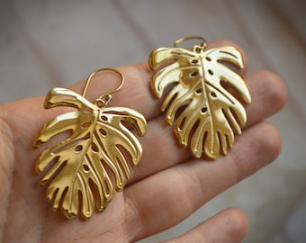 Monstera leaf dangling hoop brass earrings. Modern, boho, statement, nature inspired jewellery