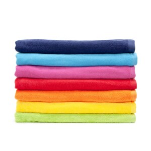 May include: A stack of seven colorful towels in a rainbow pattern. The towels are folded and stacked on top of each other. The colors of the towels are blue, light blue, pink, red, orange, yellow, and green.