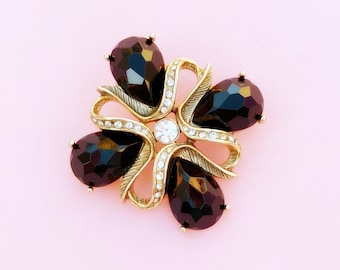 Broche onyx de ónix vintage con acentos de cristal, década de 1980