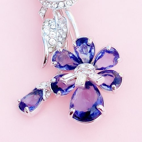 Vintage Sapphire Blue Crystal Flower Figural Brooch By Nolan Miller, selling 1980s