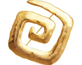 Broche modernista de gran tamaño con forma de espiral y acabado dorado de Jonette Jewelry, década de 1980