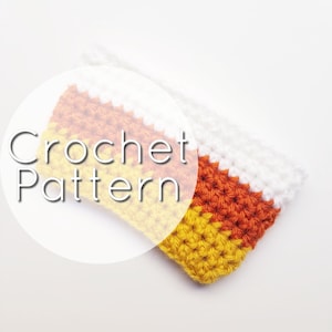 Op de afbeelding: Haakpatroon voor een item in de vorm van een snoepmais. Het item is gemaakt met wit, oranje en geel garen.