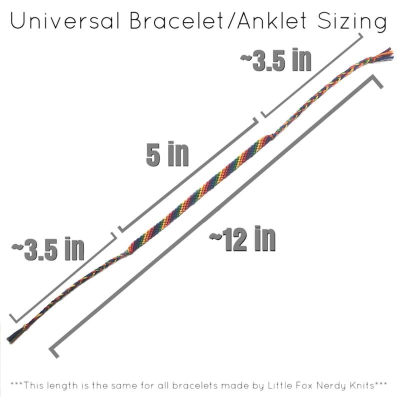 May include: Diagram showing the sizing of a rainbow colored friendship bracelet or anklet. The bracelet is approximately 12 inches long and 0.35 inches wide. The text states that this length is the same for all bracelets made by Little Fox Nerdy Knits.