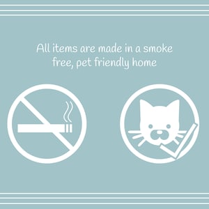 May include: White no smoking sign with a cigarette and smoke, and a white check mark in a circle with a cat's face. Text reads: All items are made in a smoke free, pet friendly home.