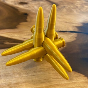 Bullet Burr Brainteaser Puzzle Design 2 - six interlocking .308 Winchester rounds, 3D printed plastic, easier than my design 3