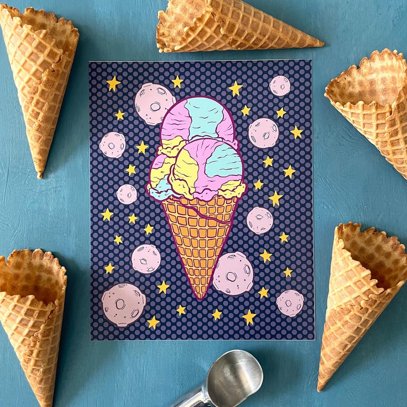 An illustration of a purple, blue, and yellow triple scoop ice cream cone is flanked by stars and moons on a purple polka dot background. The art print is surrounded by waffle conesand an ice cream scoop.