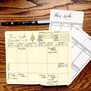 Vertical Weekly Layout Tracing Card slips under your page so you can trace the bujo layout for immediate results. Get it here.