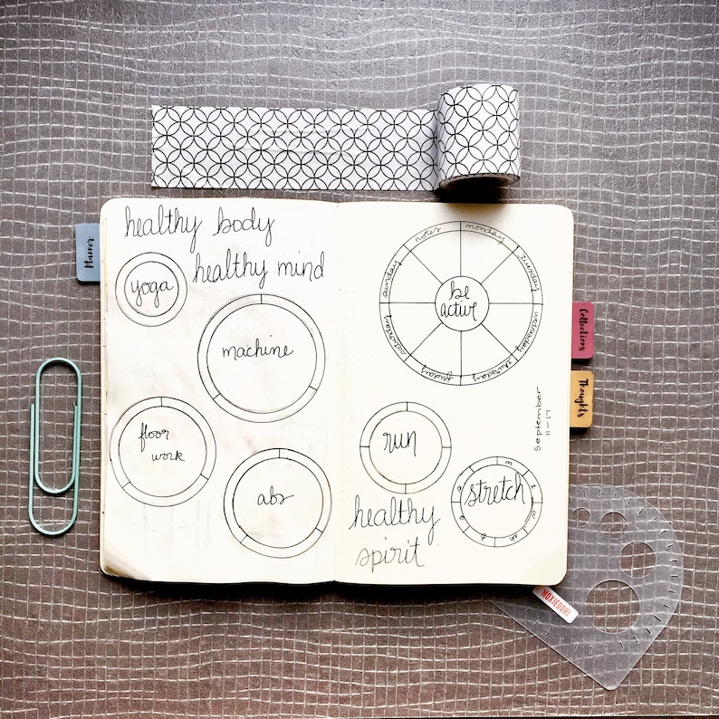 Compass Protractor™ bullet journaling stencil makes perfect concentric circles in your bullet journal. Get it exclusively here. image 8