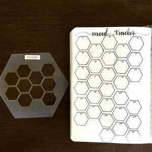 Honeycomb Hexagon bullet journaling stencil creates fun layouts. Hop over here to get it. image 9