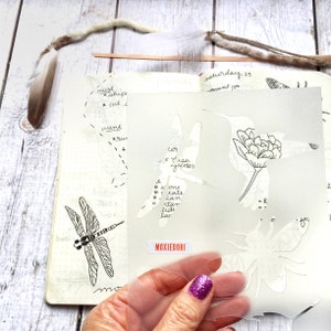 Bee hummingbird dragonfly feather bullet journaling stencil creates spring and summer themed bujo layouts. Catch it over here.